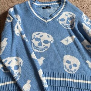 SHEIN Blue V-Neck Sweater with Skull Pattern